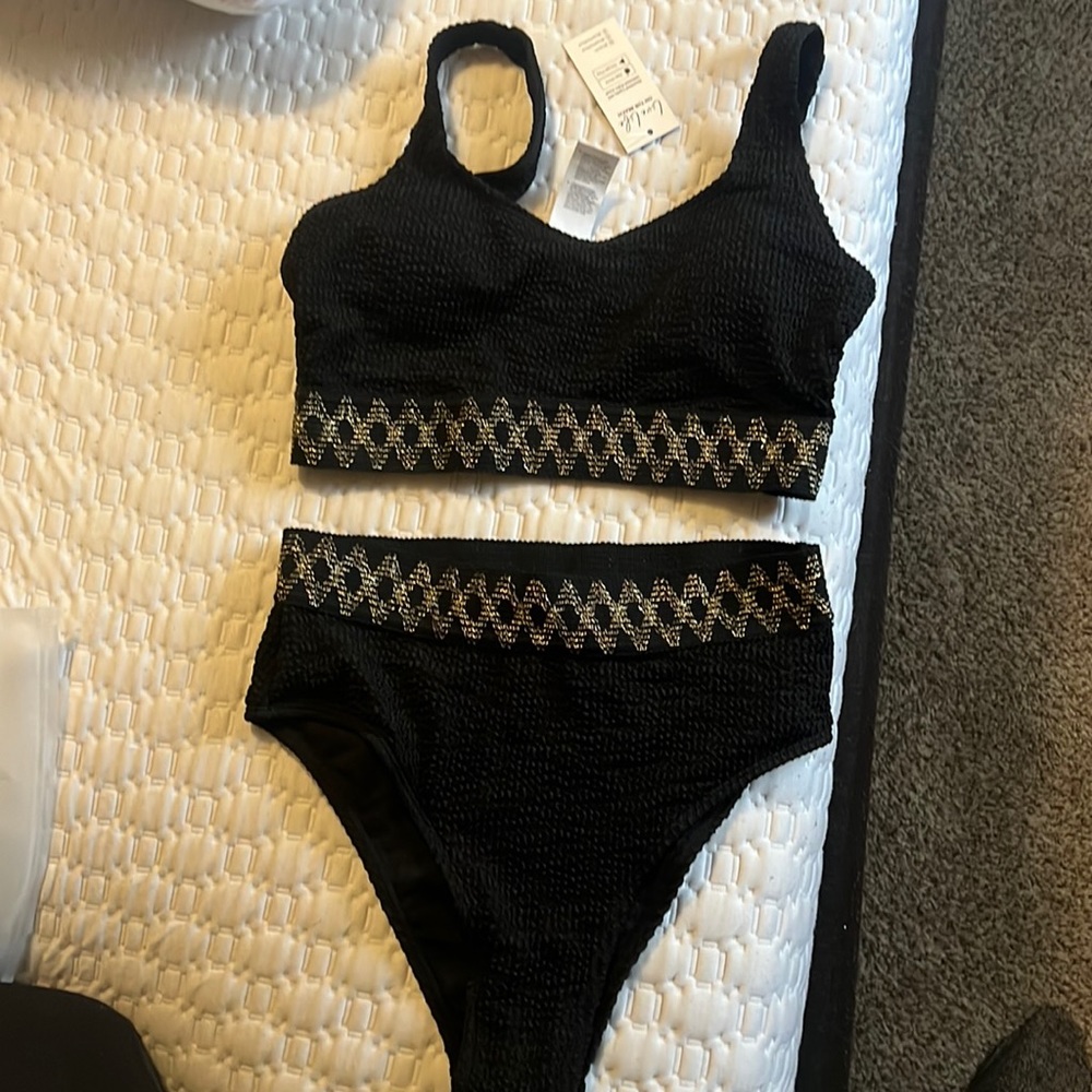 Beautiful black with gold design Bikini. Brand new with tags!